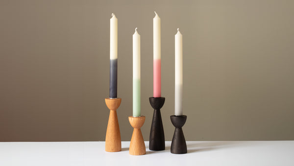 Wooden candle holder for pillar candles. Modern design, handmade in Switzerland.