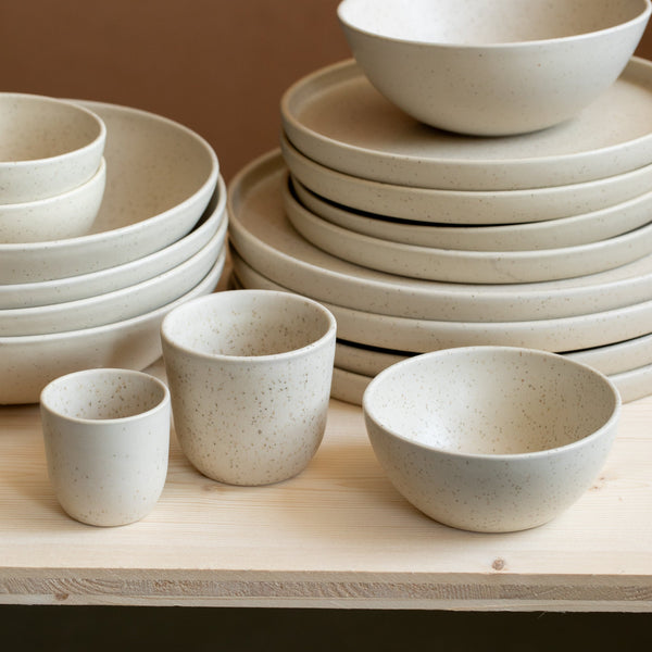 Matt crockery finely speckled in natural beige