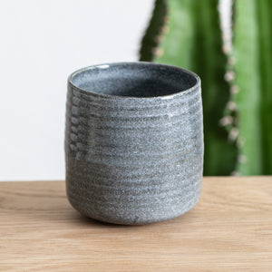 Tea coffee mug with grooves structure blue reactive glaze handmade in Portugal