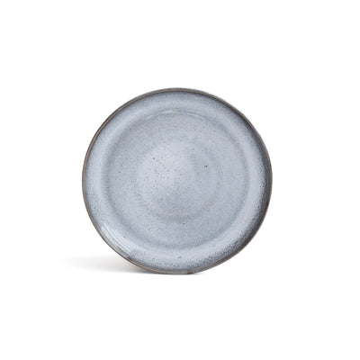 Petite assiette à hors-d'œuvre bleue légèrement chinée avec bord bleu foncé