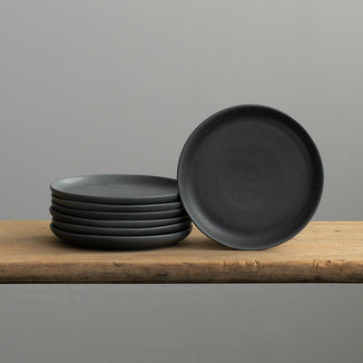 Small bread plate stacked in matt black glaze perfect as a small starter plate or bread plate