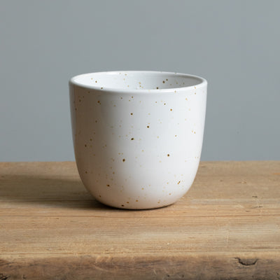 Stoneware coffee mug in white with fine golden dots