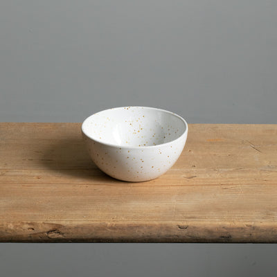 Large dip bowl seen from above with fine golden brown speckles