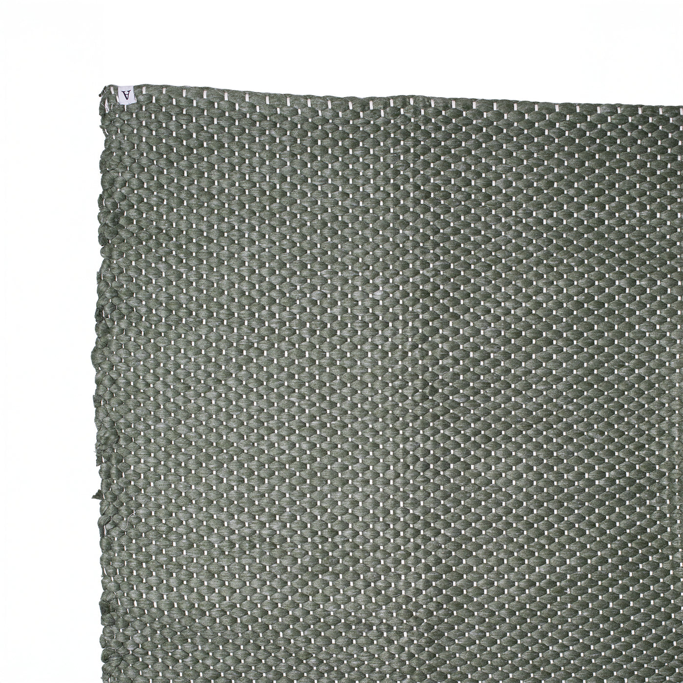 Detailaufnahme eines 150x200cm grossen Teppichs in dunkelgrün mit feinen weissen Linien handgewoben