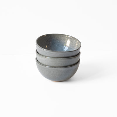 Stackable dark gray bowls with our reclaimed Stormy Sea glaze
