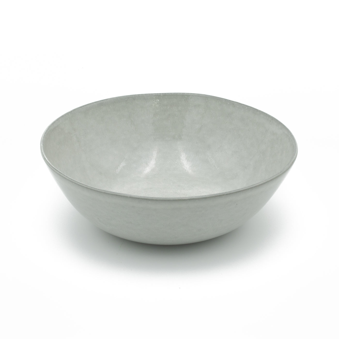 Light gray large salad bowl cut out on a white background can also be used as a pastry bowl